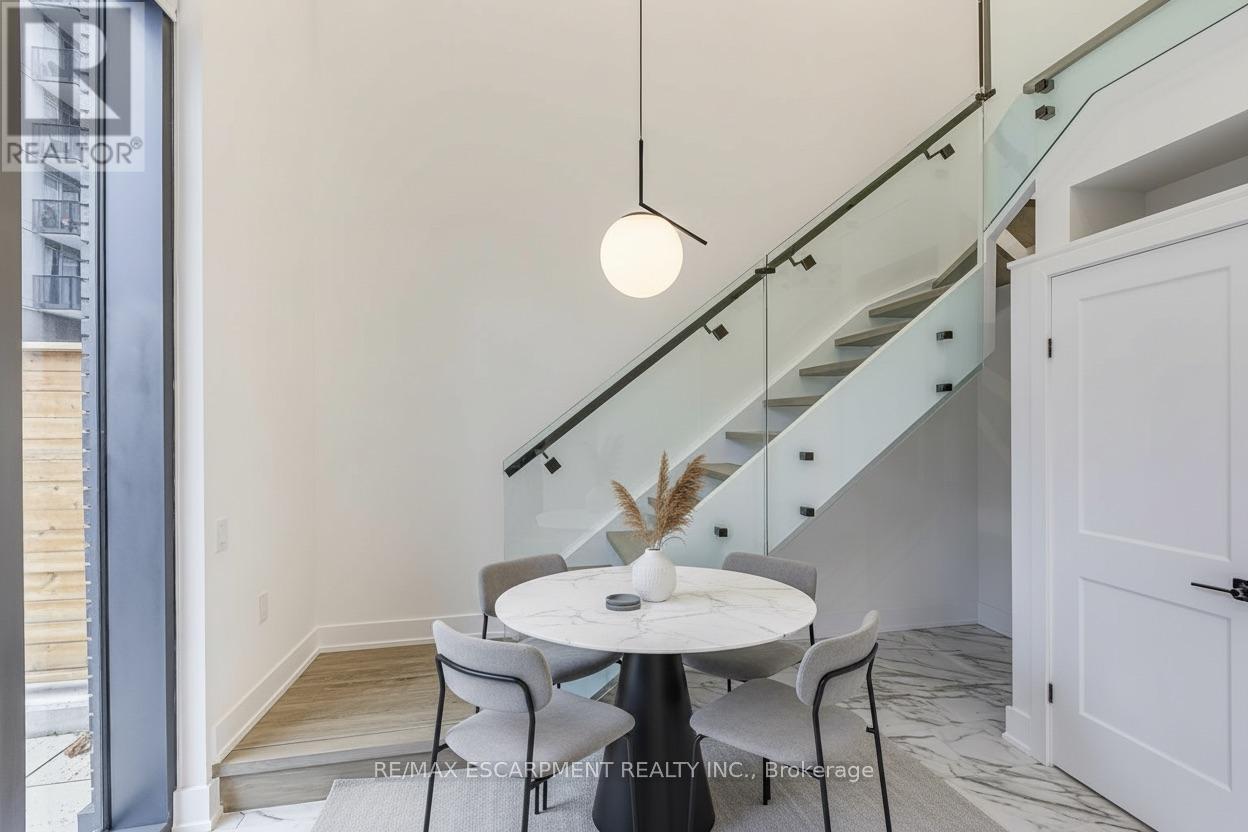 Virtually Staged - 112 - 2450 Old Bronte Road, Oakville, ON - Indoor Photo Showing Dining Room