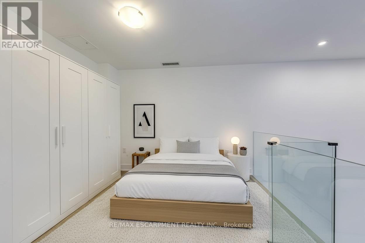 Virtually Staged - 112 - 2450 Old Bronte Road, Oakville, ON - Indoor Photo Showing Bedroom