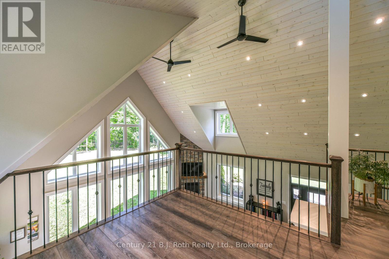 Loft area overlooking Living room - 3082 Fairgrounds Road, Severn, ON - Indoor Photo Showing Other Room