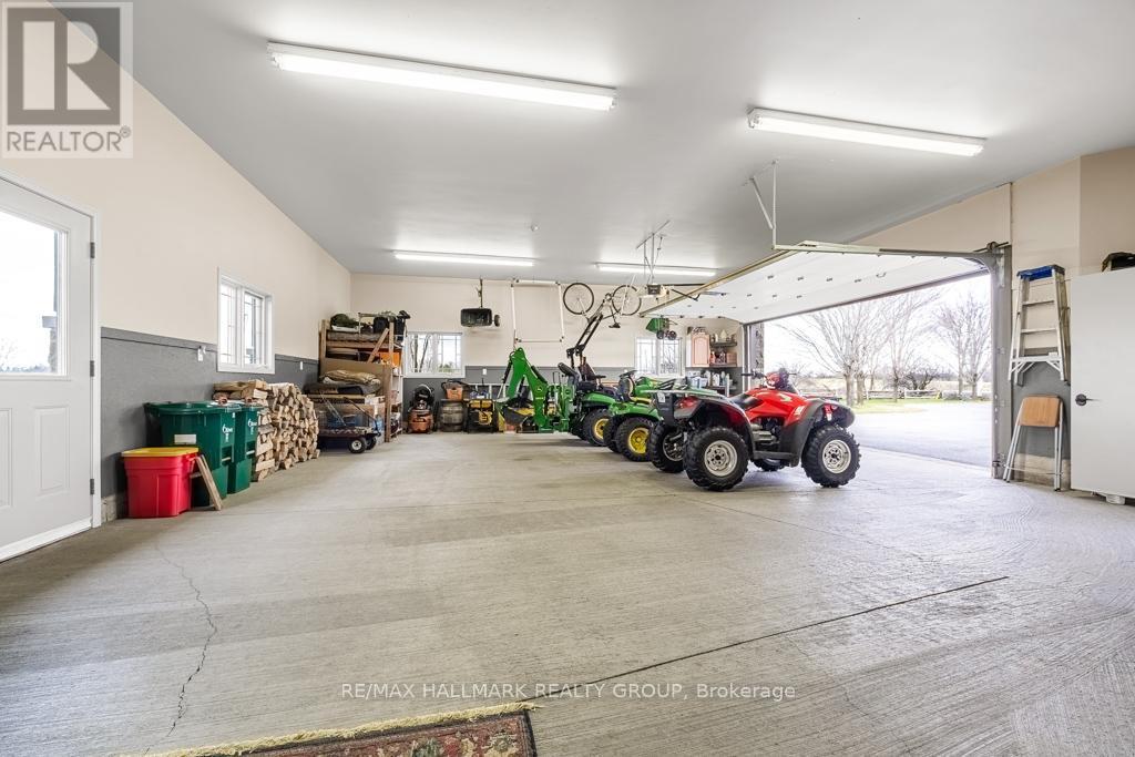 Extra Large Garage with backdoor access - 6980 Mansfield Road, Ottawa, ON - Indoor Photo Showing Garage