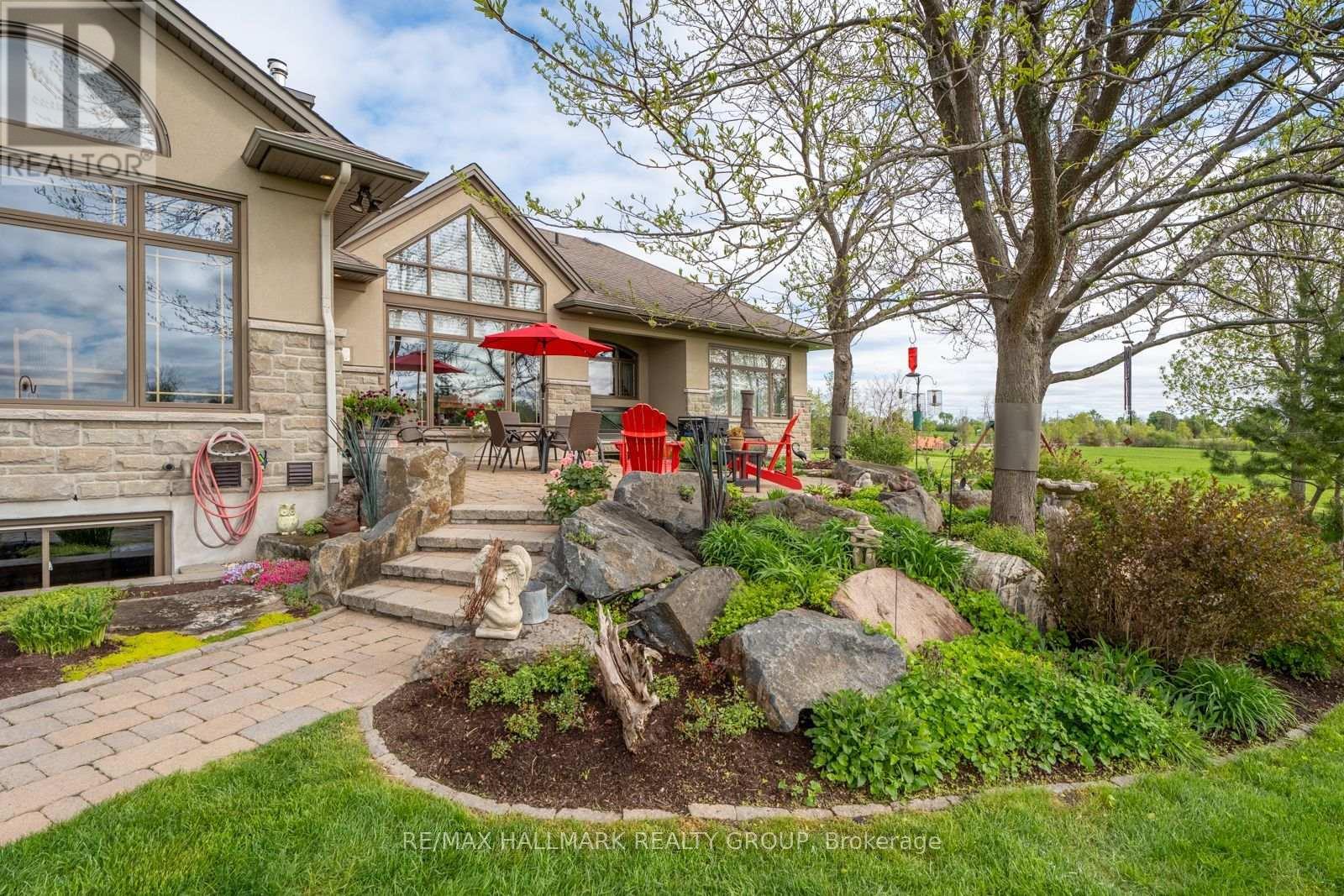 Beautiful Gardens in the Backyard - 6980 Mansfield Road, Ottawa, ON - Outdoor With Deck Patio Veranda
