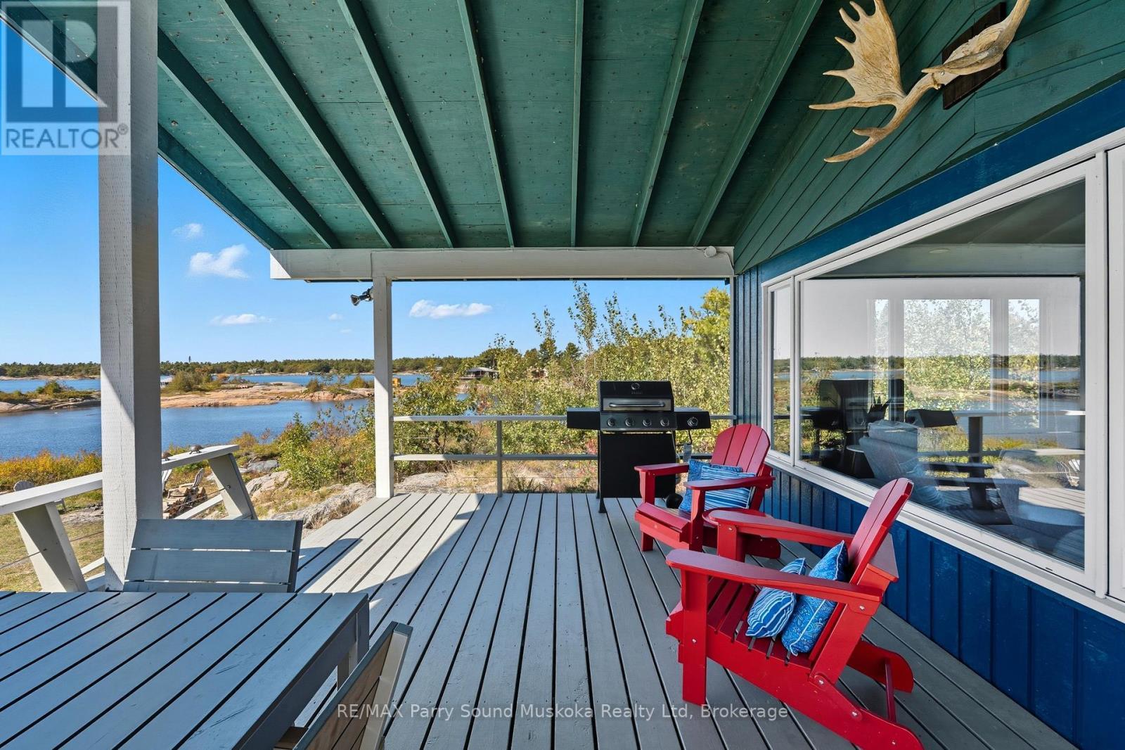 15 Forsyths Road, Carling, ON - Outdoor With Body Of Water With Deck Patio Veranda With View With Exterior