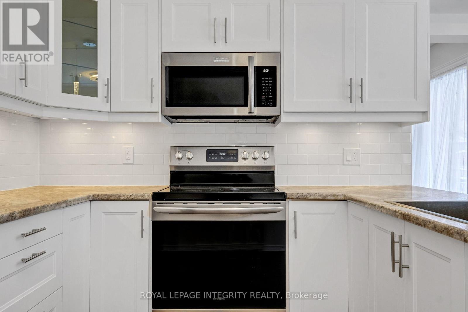 RENOVATED KITCHEN - 2177 Lenester Avenue, Ottawa, ON - Indoor Photo Showing Kitchen With Upgraded Kitchen