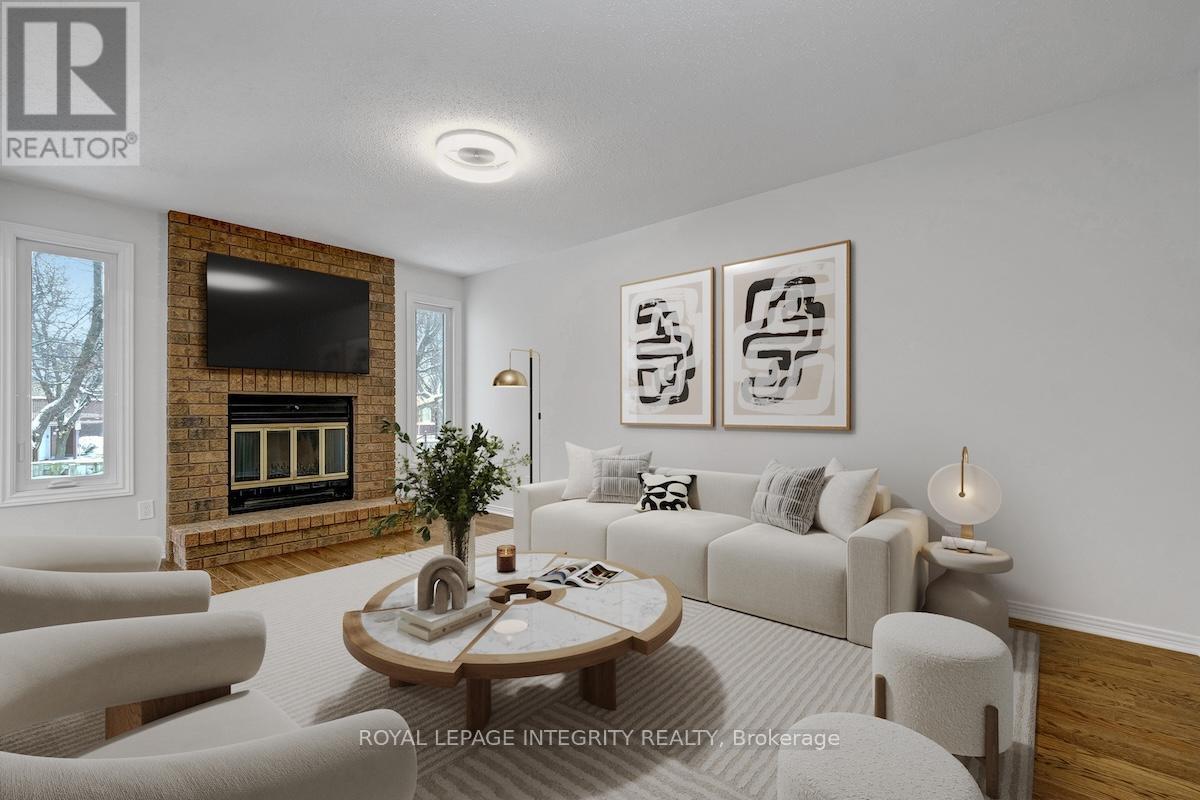 MAIN FLOOR FAMILY ROOM - 2177 Lenester Avenue, Ottawa, ON - Indoor Photo Showing Living Room With Fireplace