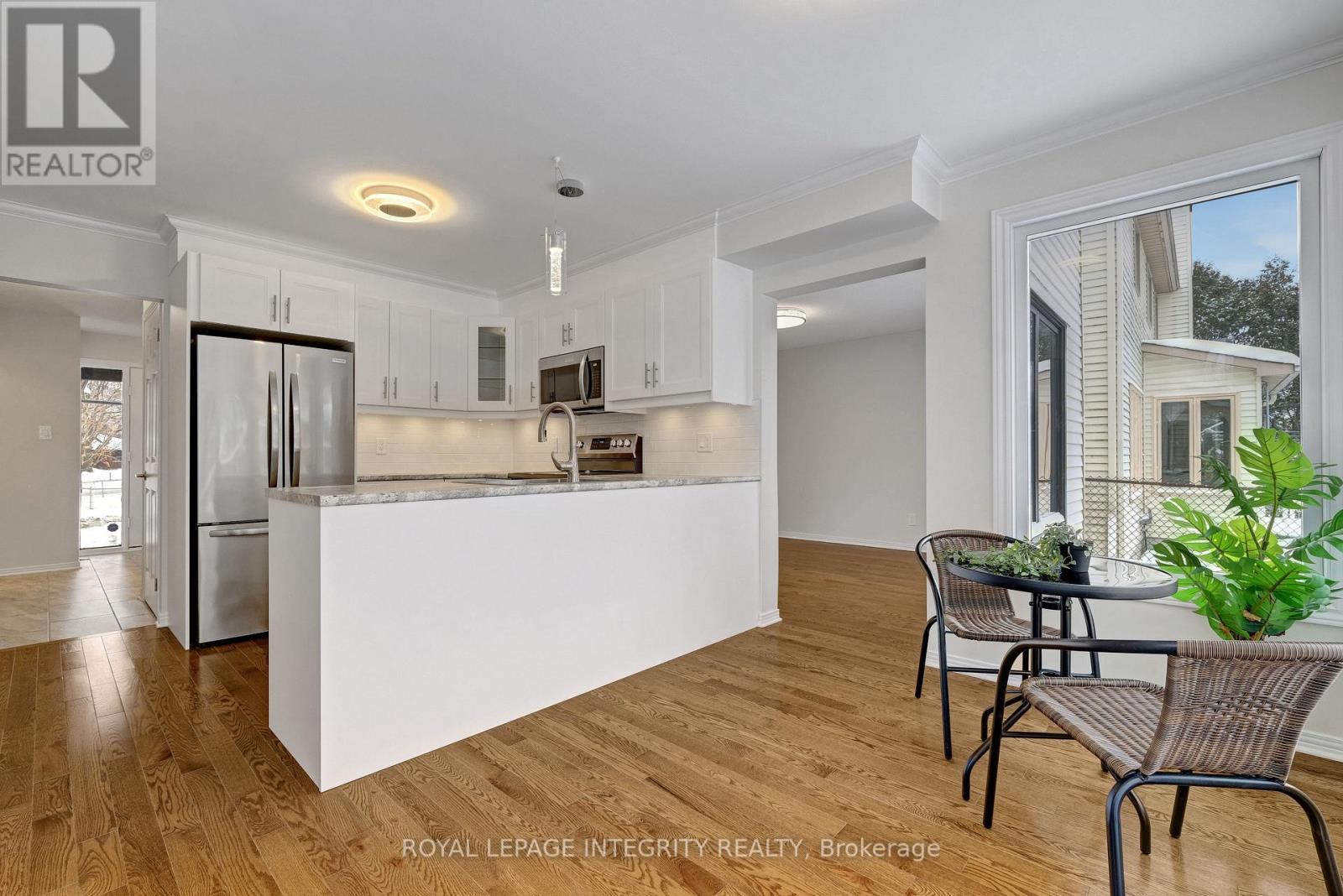 RENOVATED KITCHEN - 2177 Lenester Avenue, Ottawa, ON - Indoor Photo Showing Kitchen
