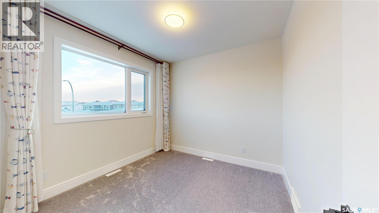 407 Kenaschuk Crescent, Saskatoon, SK - Indoor Photo Showing Other Room