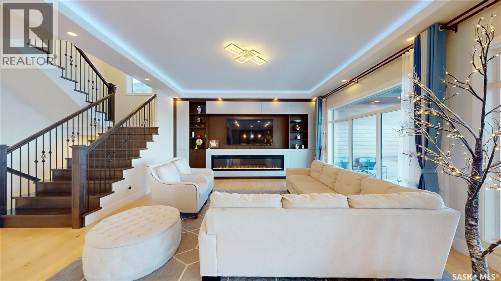 407 Kenaschuk Crescent, Saskatoon, SK - Indoor Photo Showing Other Room With Fireplace