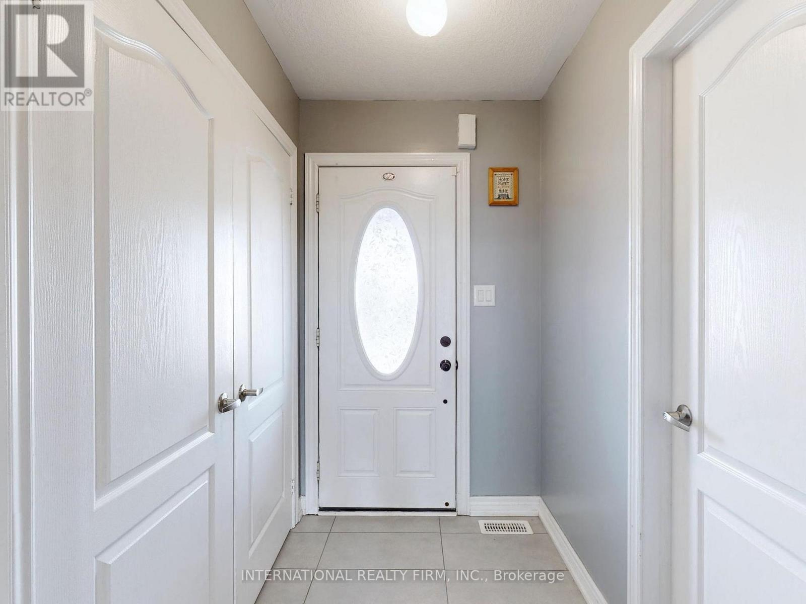 Foyer with large closet - 110 Swenson Street, New Tecumseth, ON - Indoor Photo Showing Other Room