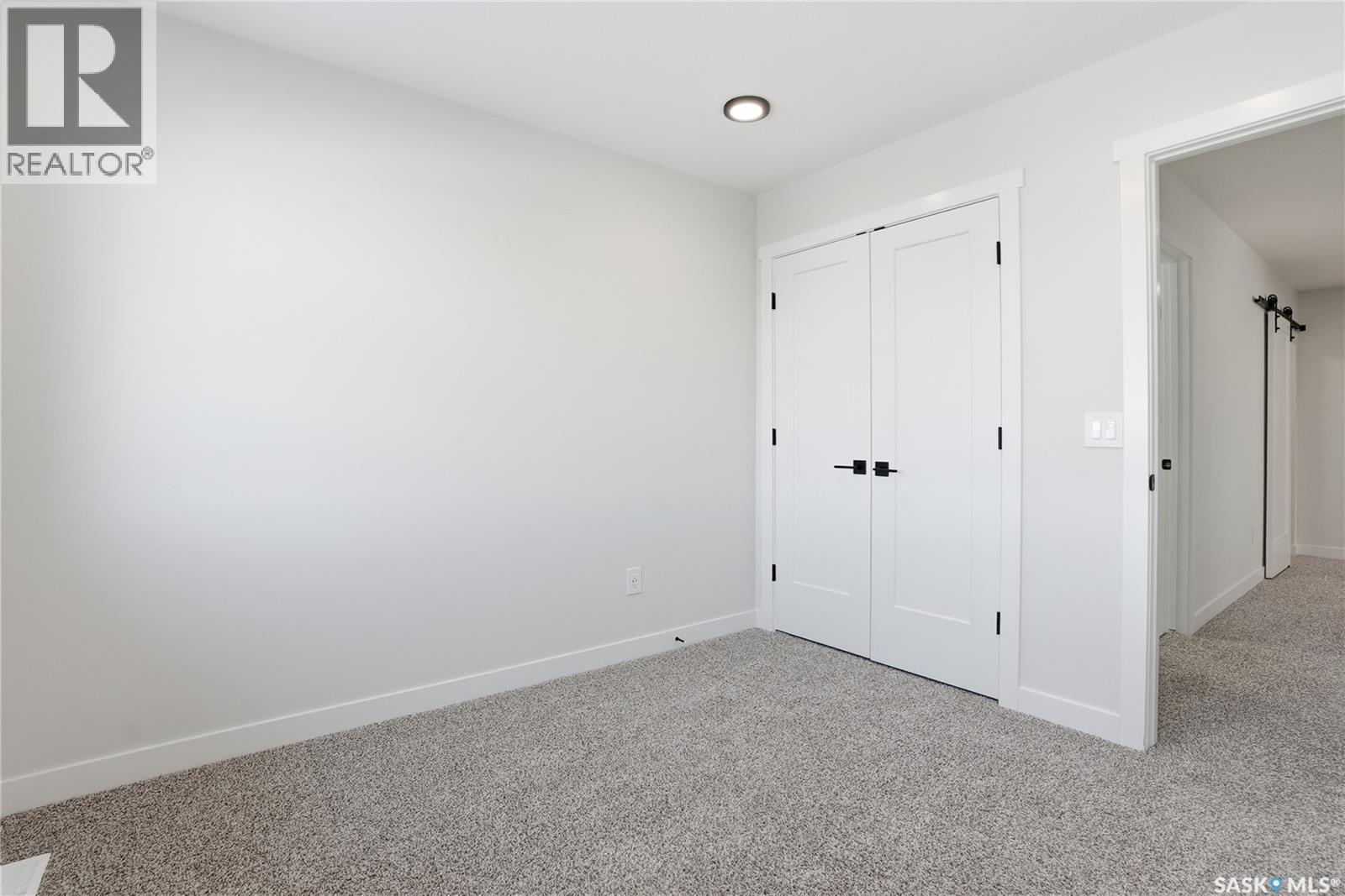 134 Chelsom Bend, Saskatoon, SK - Indoor Photo Showing Other Room