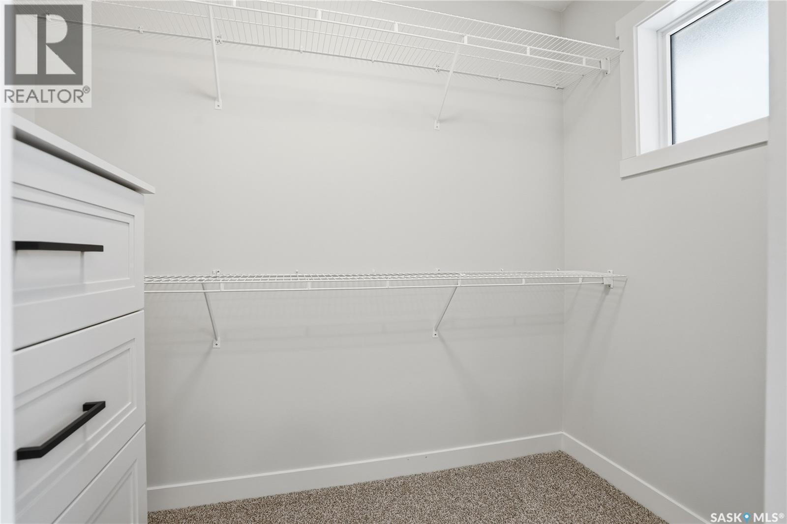 134 Chelsom Bend, Saskatoon, SK - Indoor With Storage