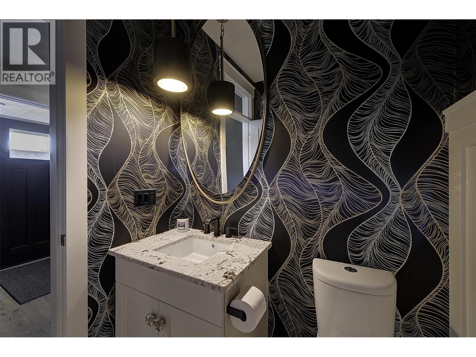 Bathroom near front entrance - 5499 Mountainside Drive, Kelowna, BC - Indoor Photo Showing Bathroom