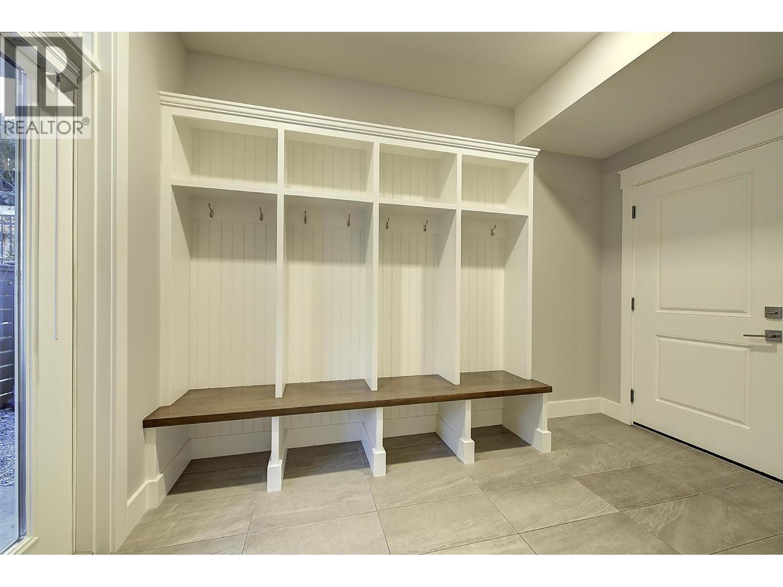 Boot room near garage entrance/exit - 5499 Mountainside Drive, Kelowna, BC - Indoor With Storage