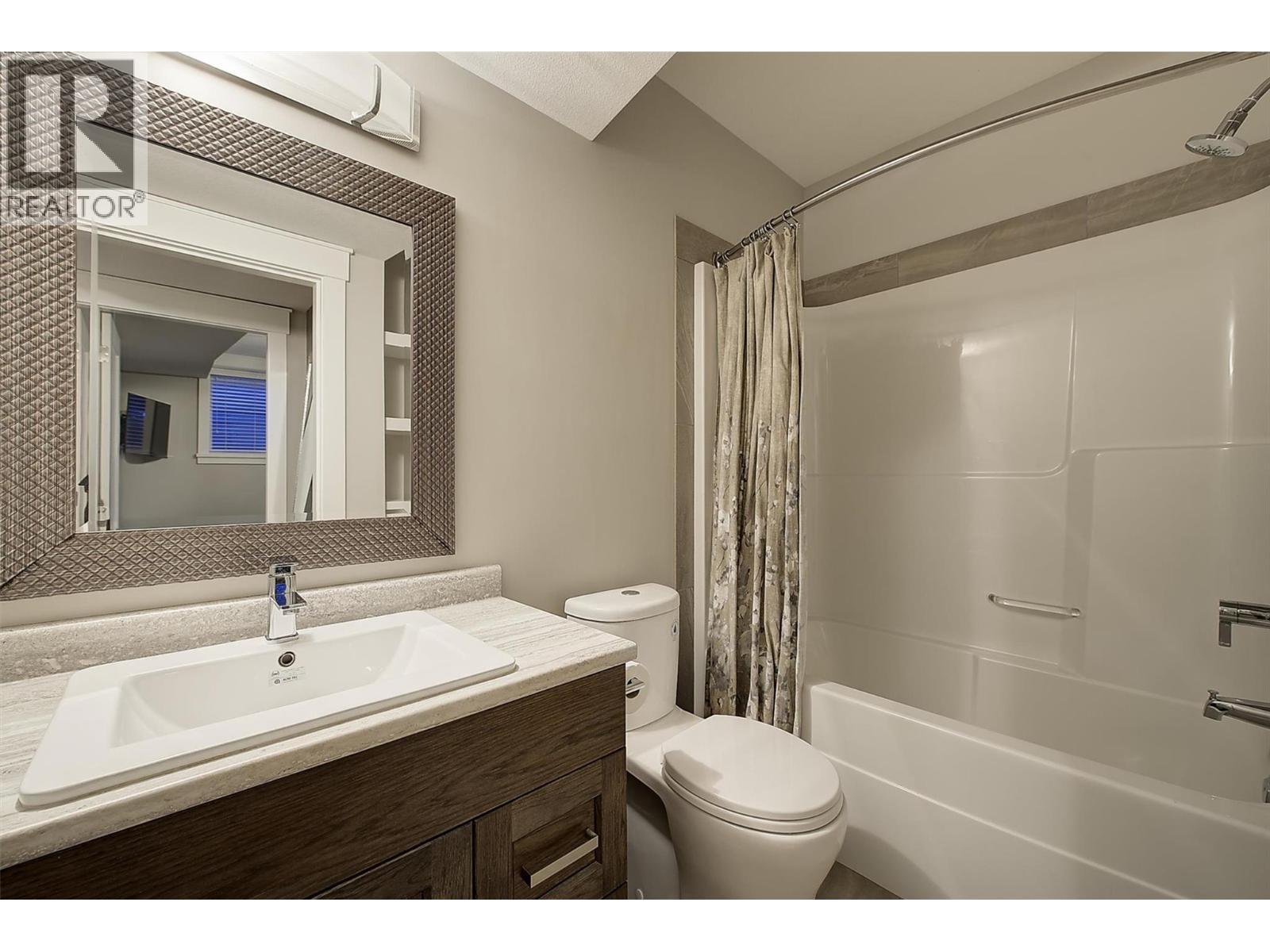 Downstairs bathroom - 5499 Mountainside Drive, Kelowna, BC - Indoor Photo Showing Bathroom