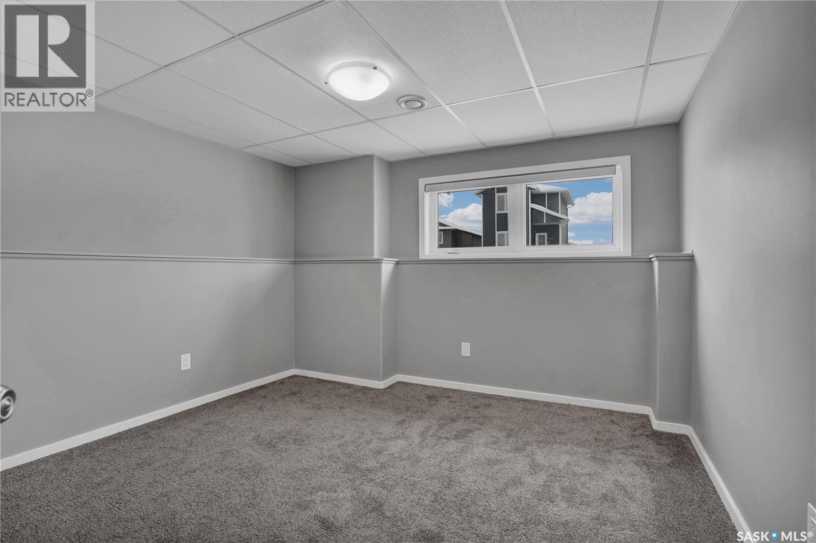 104 Reddekopp Crescent, Warman, SK - Indoor Photo Showing Other Room