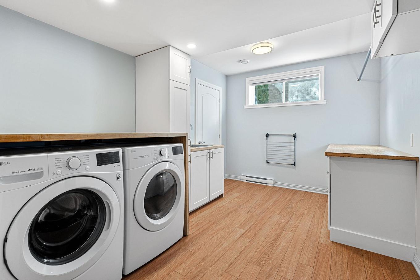 Salle de lavage - 314 Rue De Gascogne, Boucherville, QC - Indoor Photo Showing Laundry Room