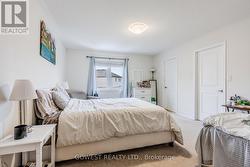 Primary bedroom with walk-in closet -