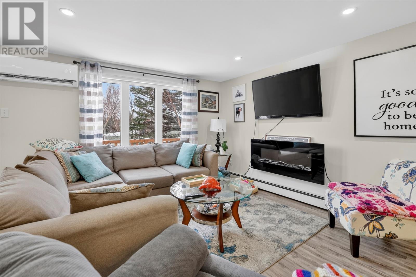 85 First Colony Drive, Cupids, NL - Indoor Photo Showing Living Room With Fireplace