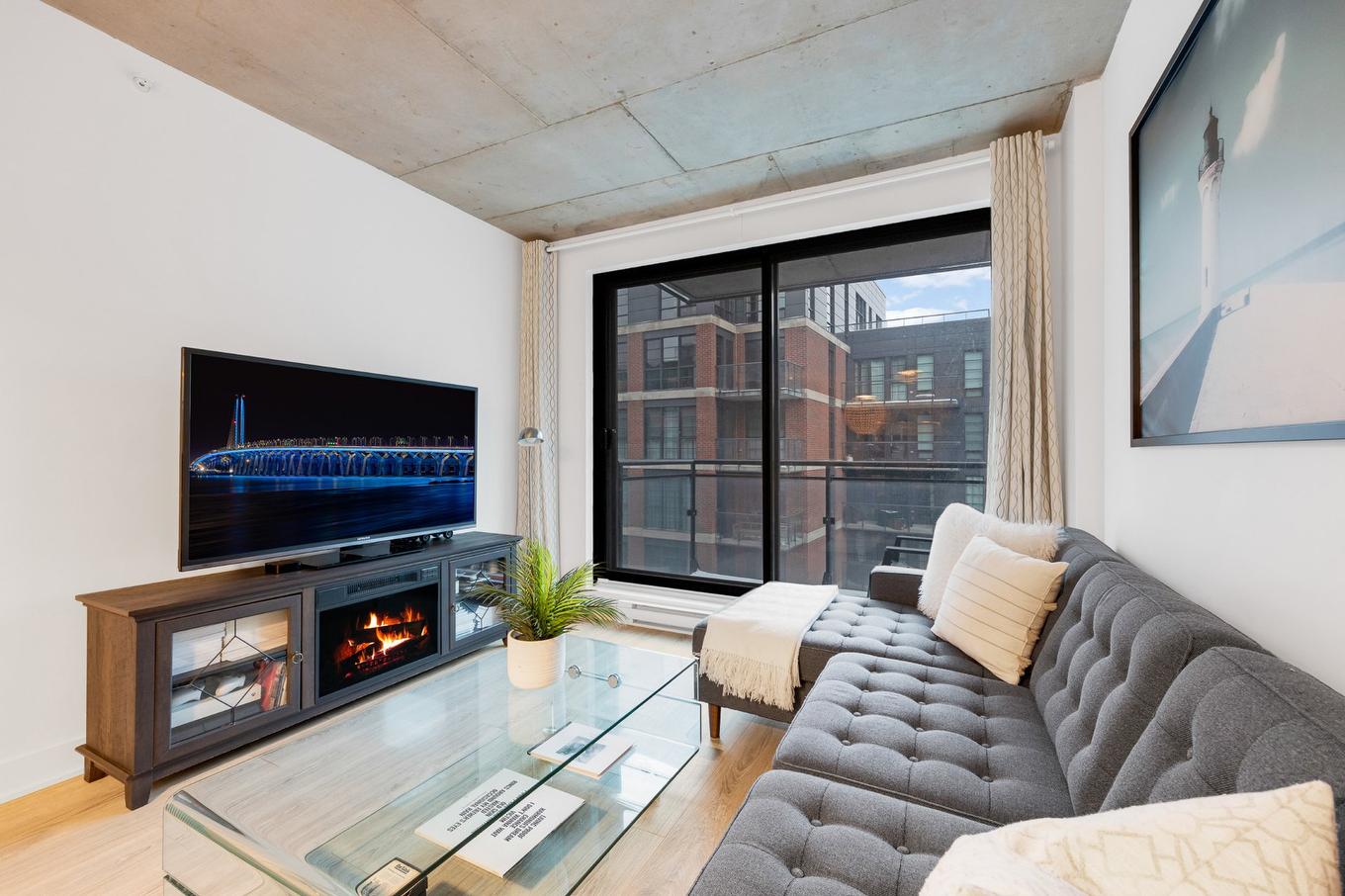 Living room - 1210-1228 Rue Des Bassins, Montréal (Le Sud-Ouest), QC - Indoor With Fireplace