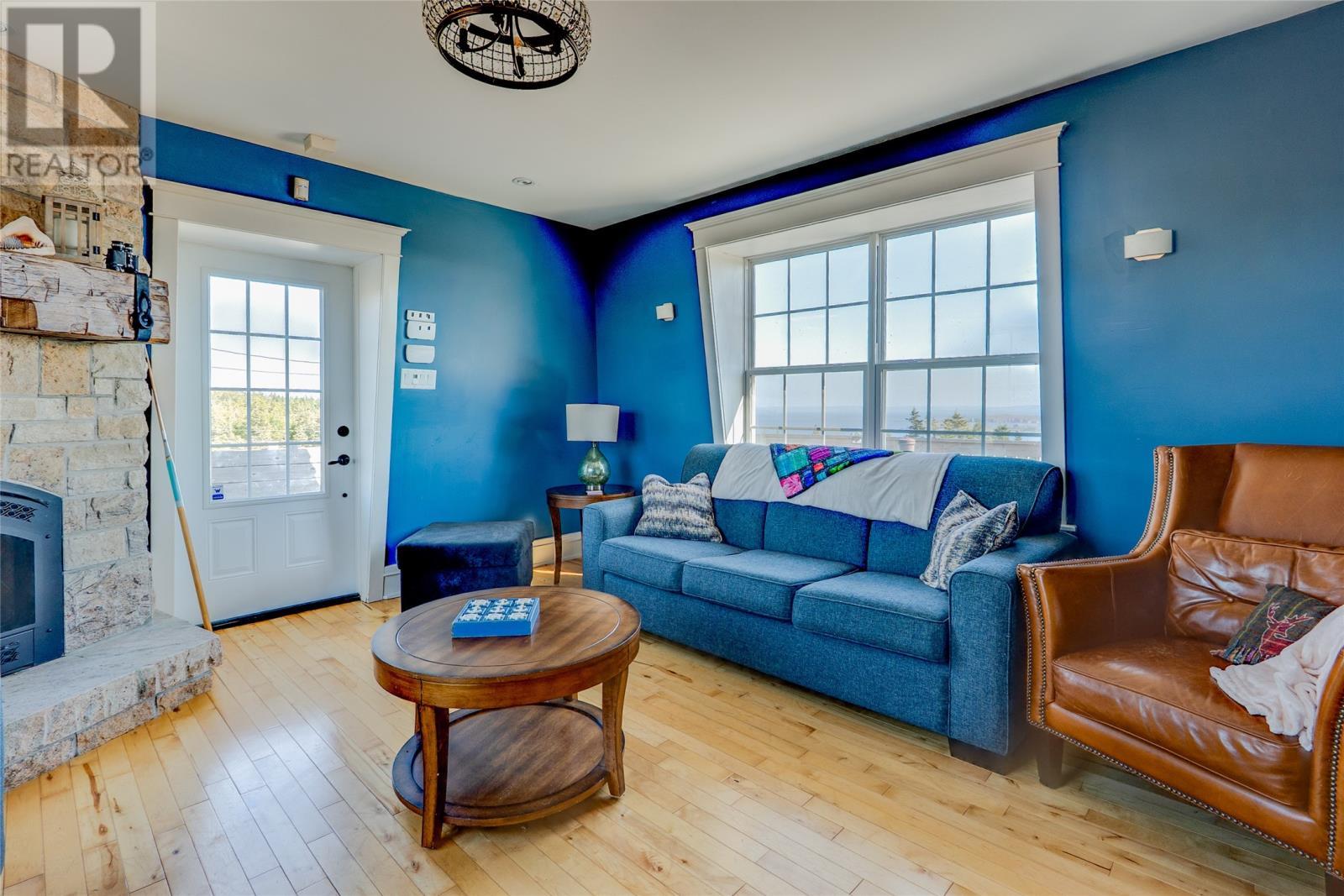56 Pottles Lane, Upper Island Cove, NL - Indoor Photo Showing Living Room With Fireplace