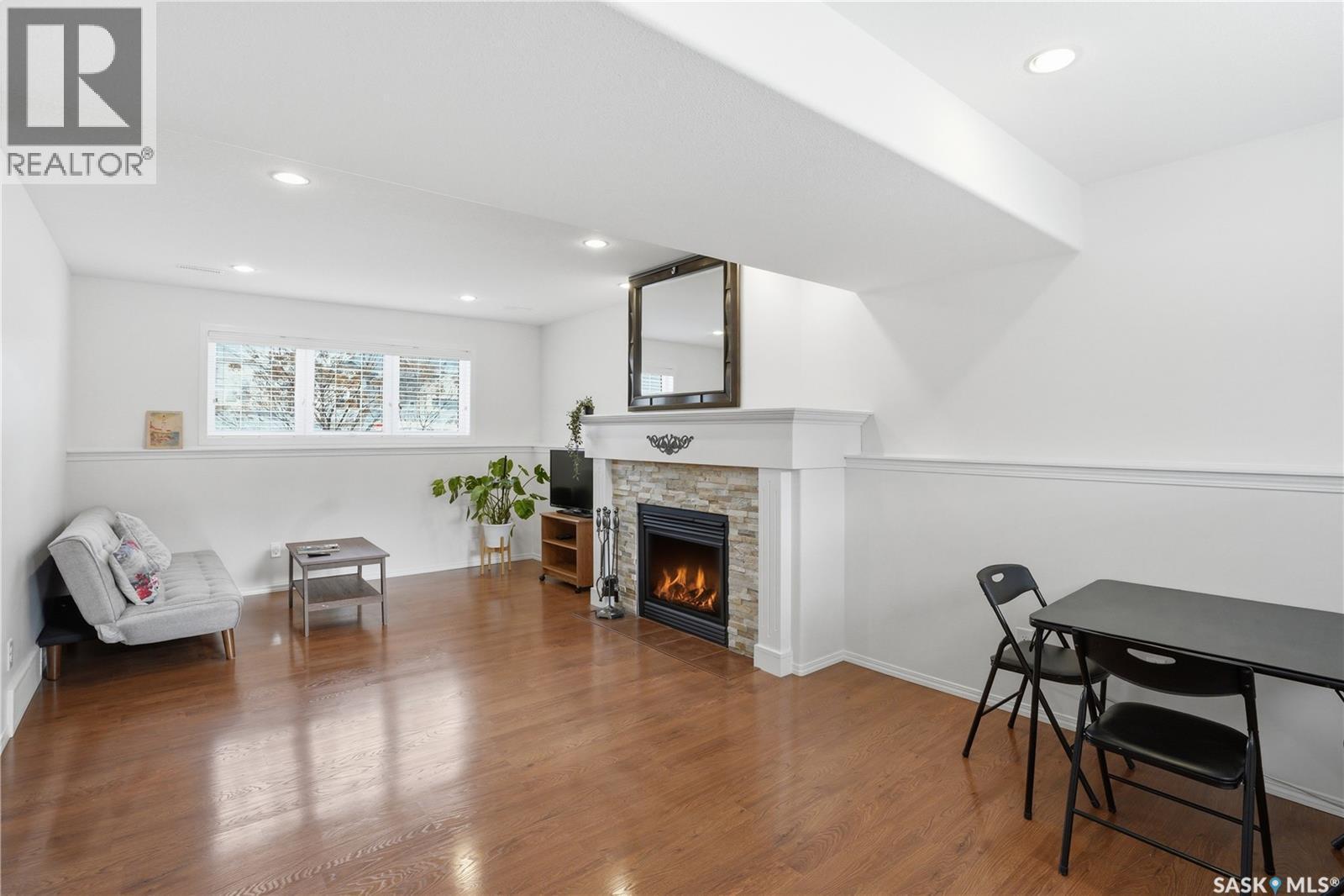 1410 Paton Crescent, Saskatoon, SK - Indoor Photo Showing Living Room With Fireplace