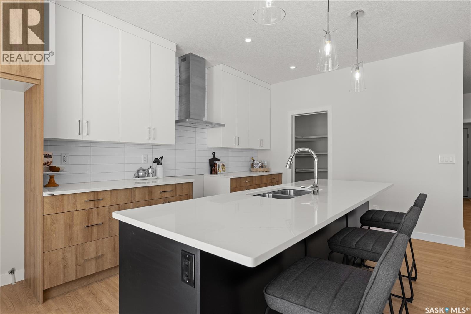 934 Brighton Gate, Saskatoon, SK - Indoor Photo Showing Kitchen With Double Sink With Upgraded Kitchen