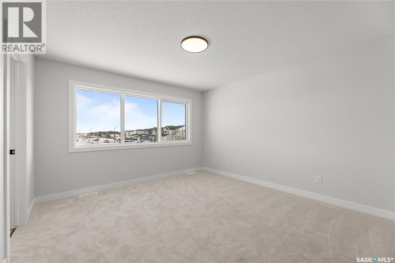 934 Brighton Gate, Saskatoon, SK - Indoor Photo Showing Other Room