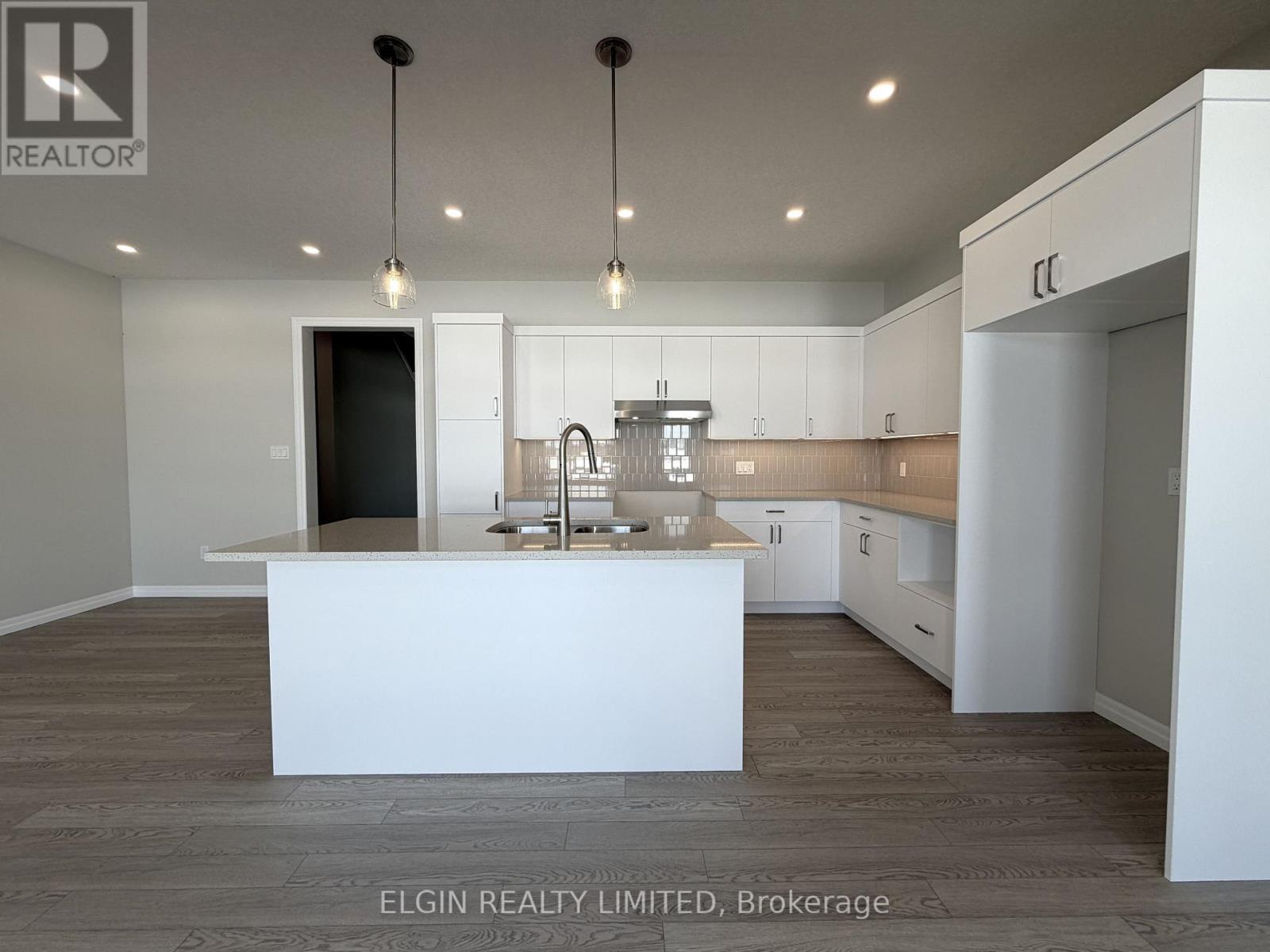 55 Woodcock Drive, Tillsonburg, ON - Indoor Photo Showing Kitchen With Double Sink