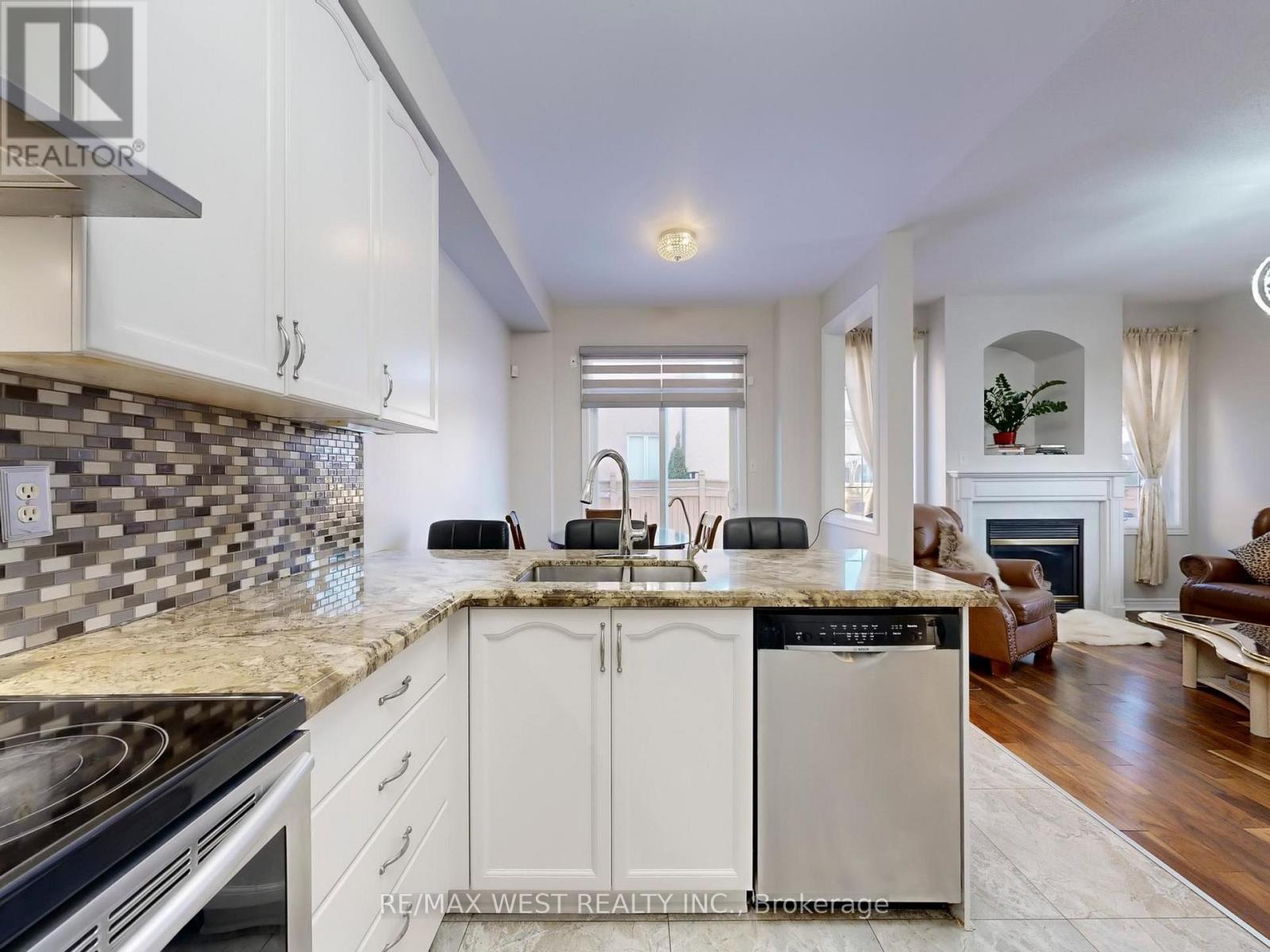 56 Planter Crescent, Vaughan, ON - Indoor Photo Showing Kitchen With Fireplace