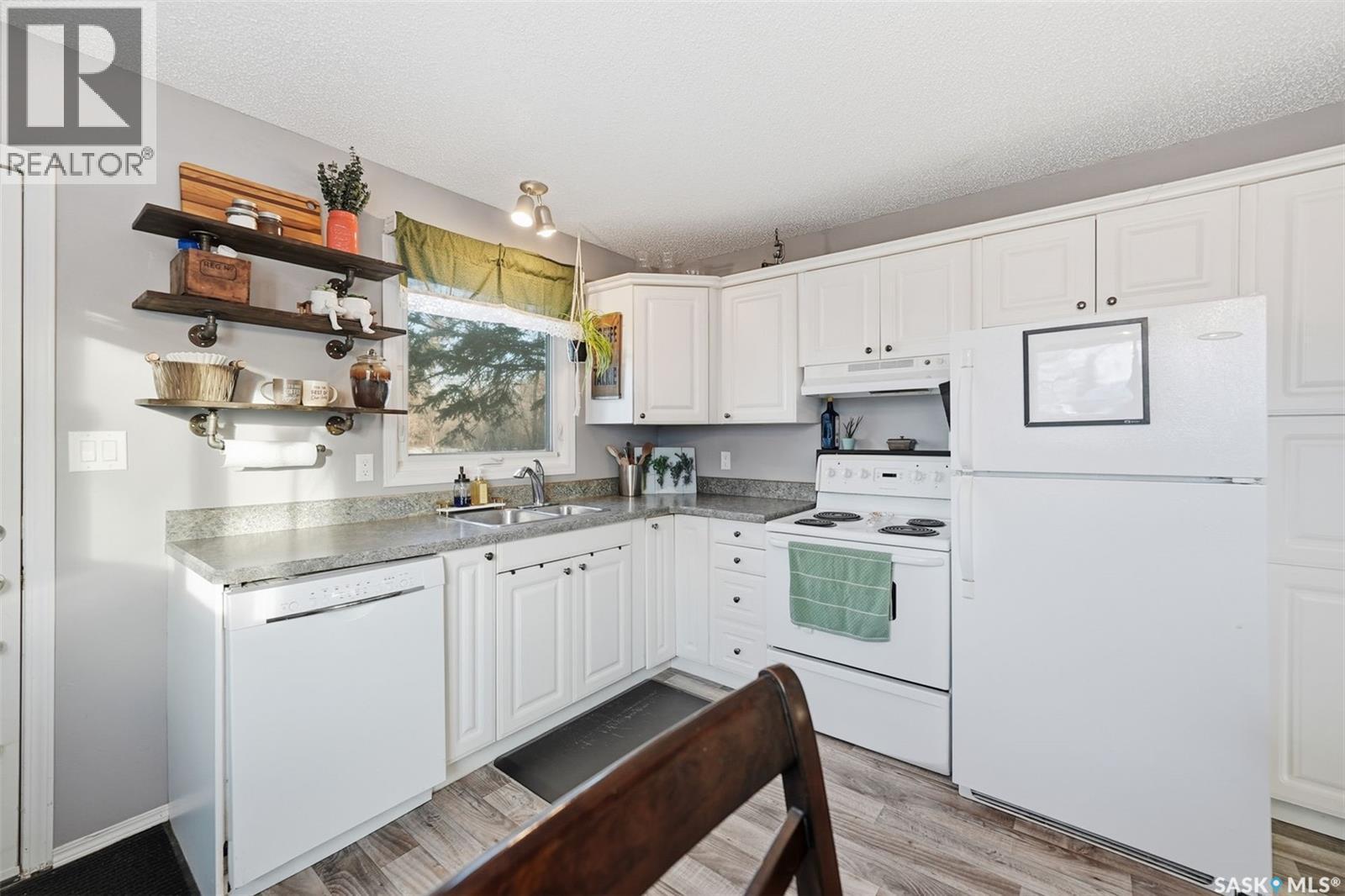 42 Macdowall Crescent, Prince Albert, SK - Indoor Photo Showing Kitchen With Double Sink