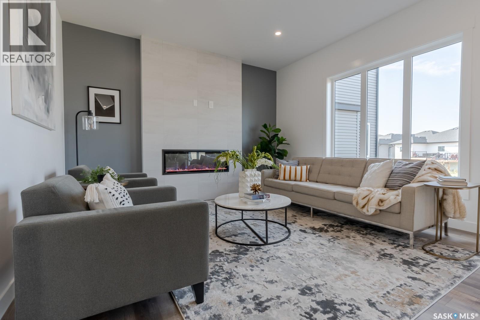 421 Traeger Close, Saskatoon, SK - Indoor Photo Showing Living Room With Fireplace