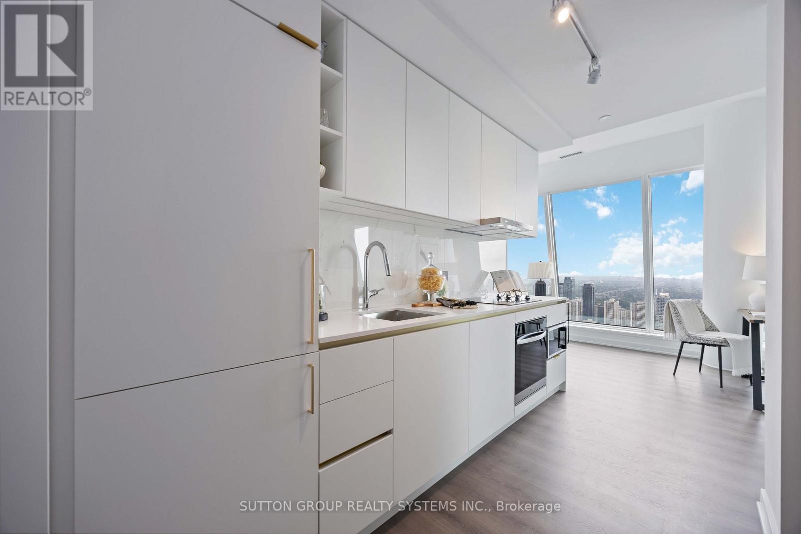 Lph05 - 8 Wellesley Street W, Toronto, ON - Indoor Photo Showing Kitchen