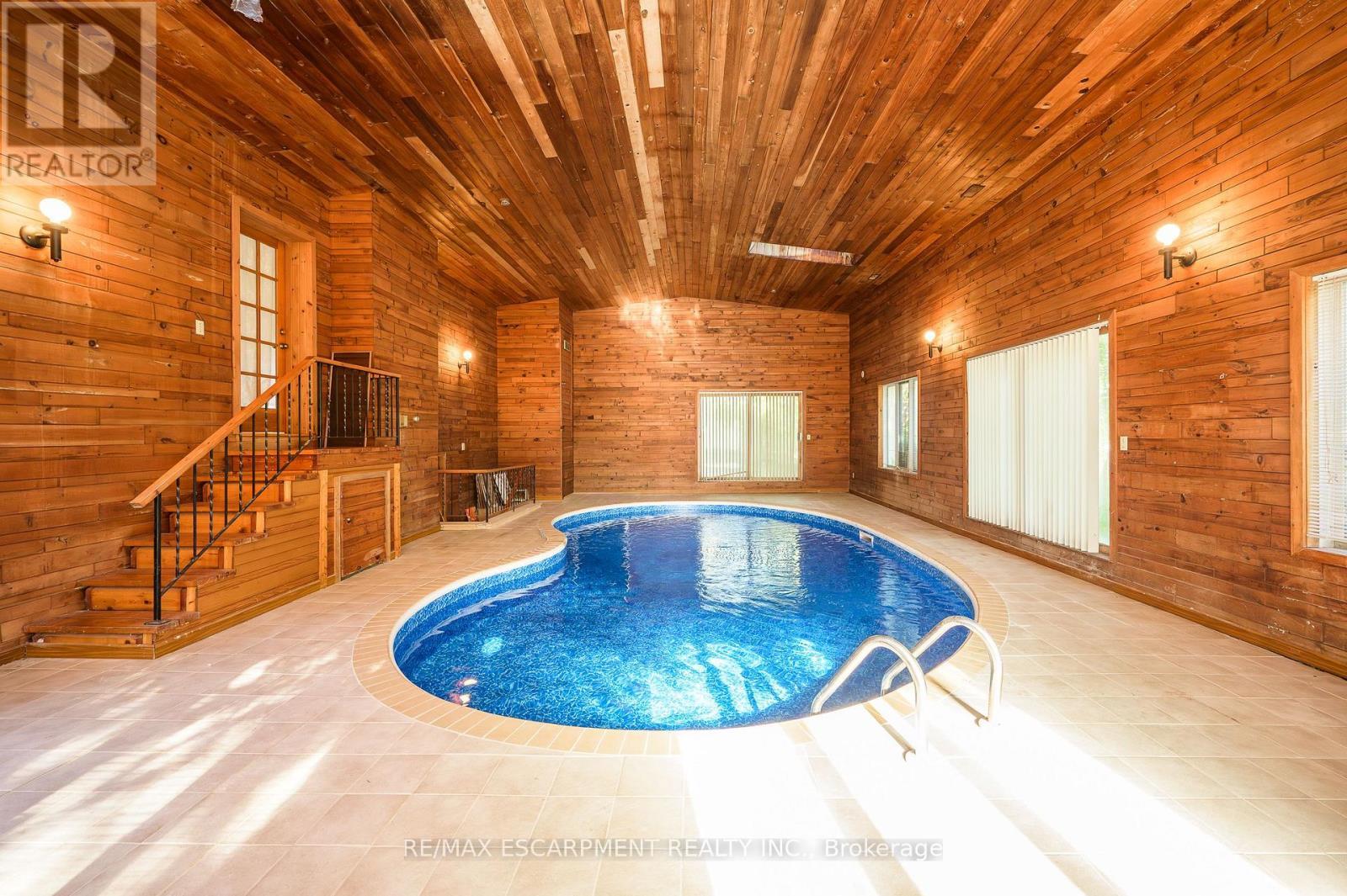 1411 Beaufort Drive, Burlington, ON - Indoor Photo Showing Other Room With In Ground Pool