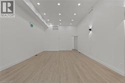 Spare room featuring light wood-style floors and recessed lighting -