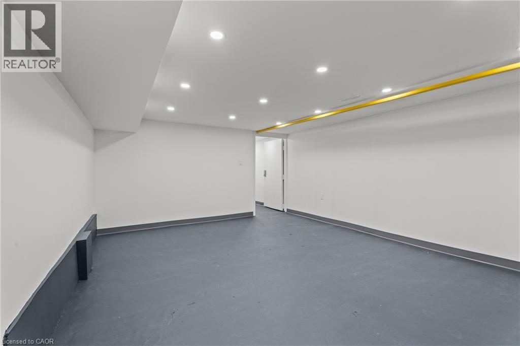 Finished below grade area with recessed lighting - 93 John Street S, Hamilton, ON
