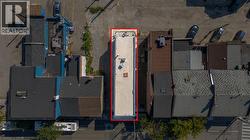 Aerial overview of property's location with property parcel outlined -