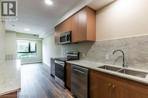 580 Coldstream Drive Unit# 201, Waterloo, ON - Indoor Photo Showing Kitchen With Double Sink