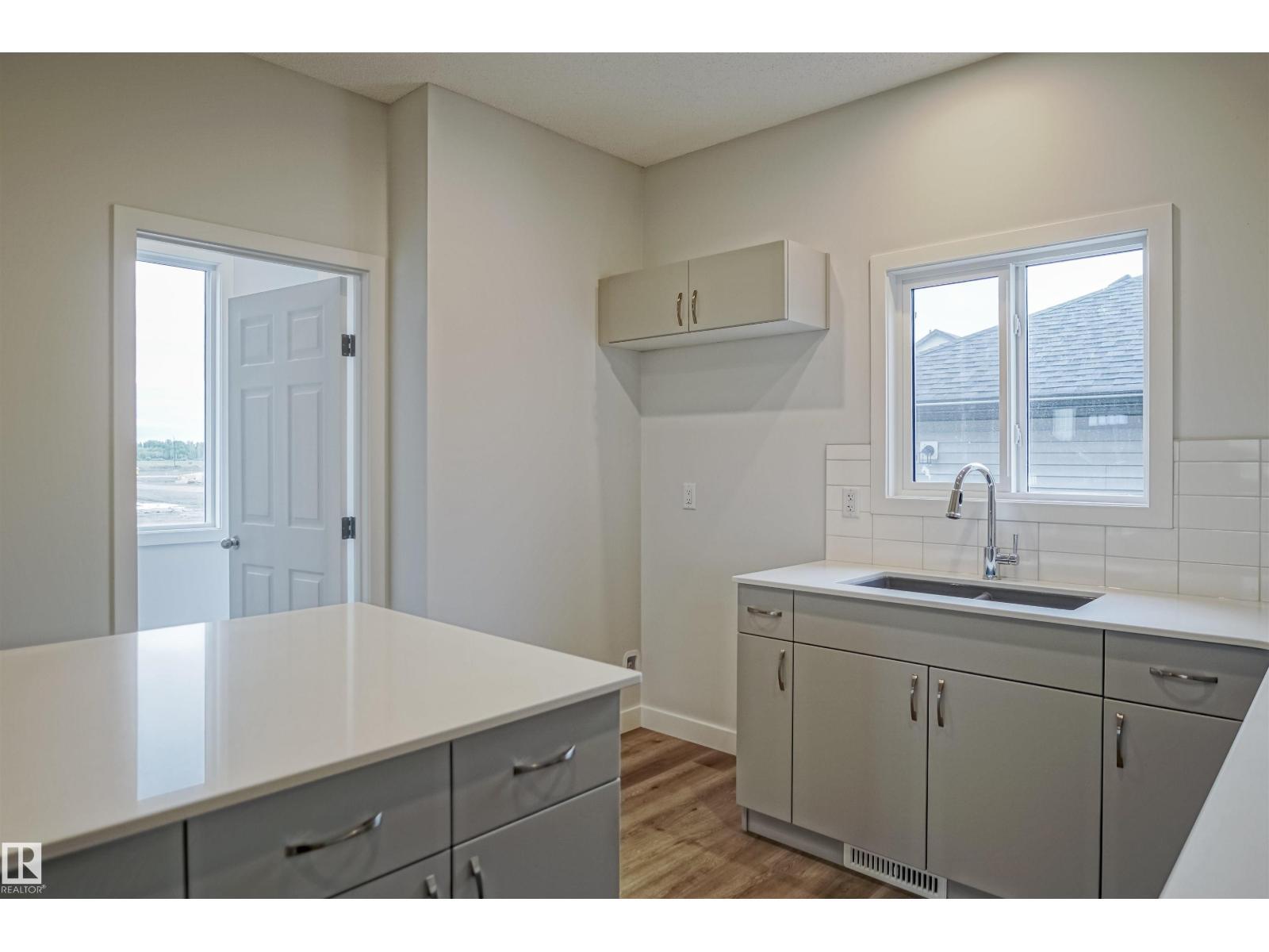 119 Copperhaven Dr, Spruce Grove, AB - Indoor Photo Showing Kitchen With Double Sink