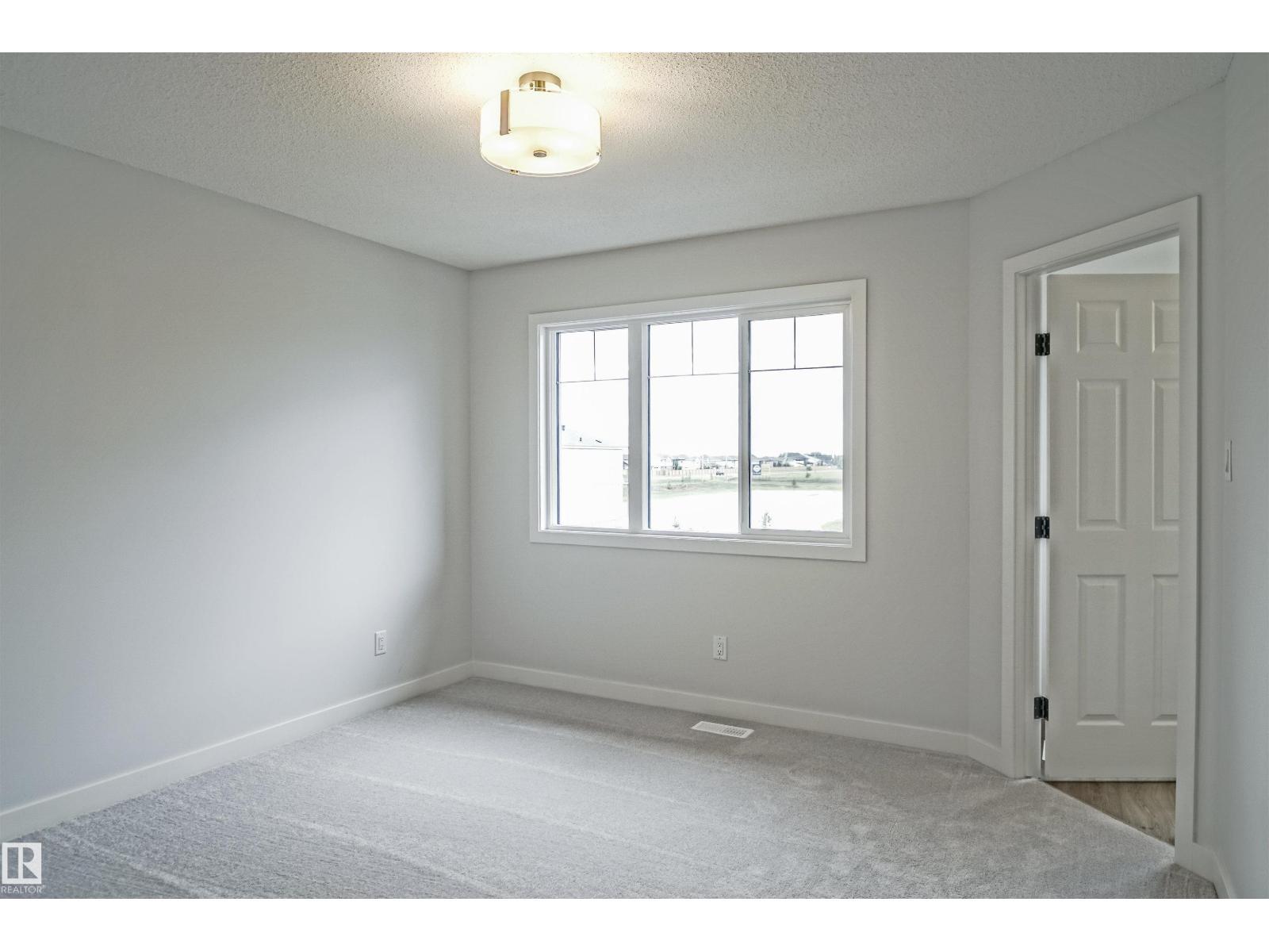 119 Copperhaven Dr, Spruce Grove, AB - Indoor Photo Showing Other Room