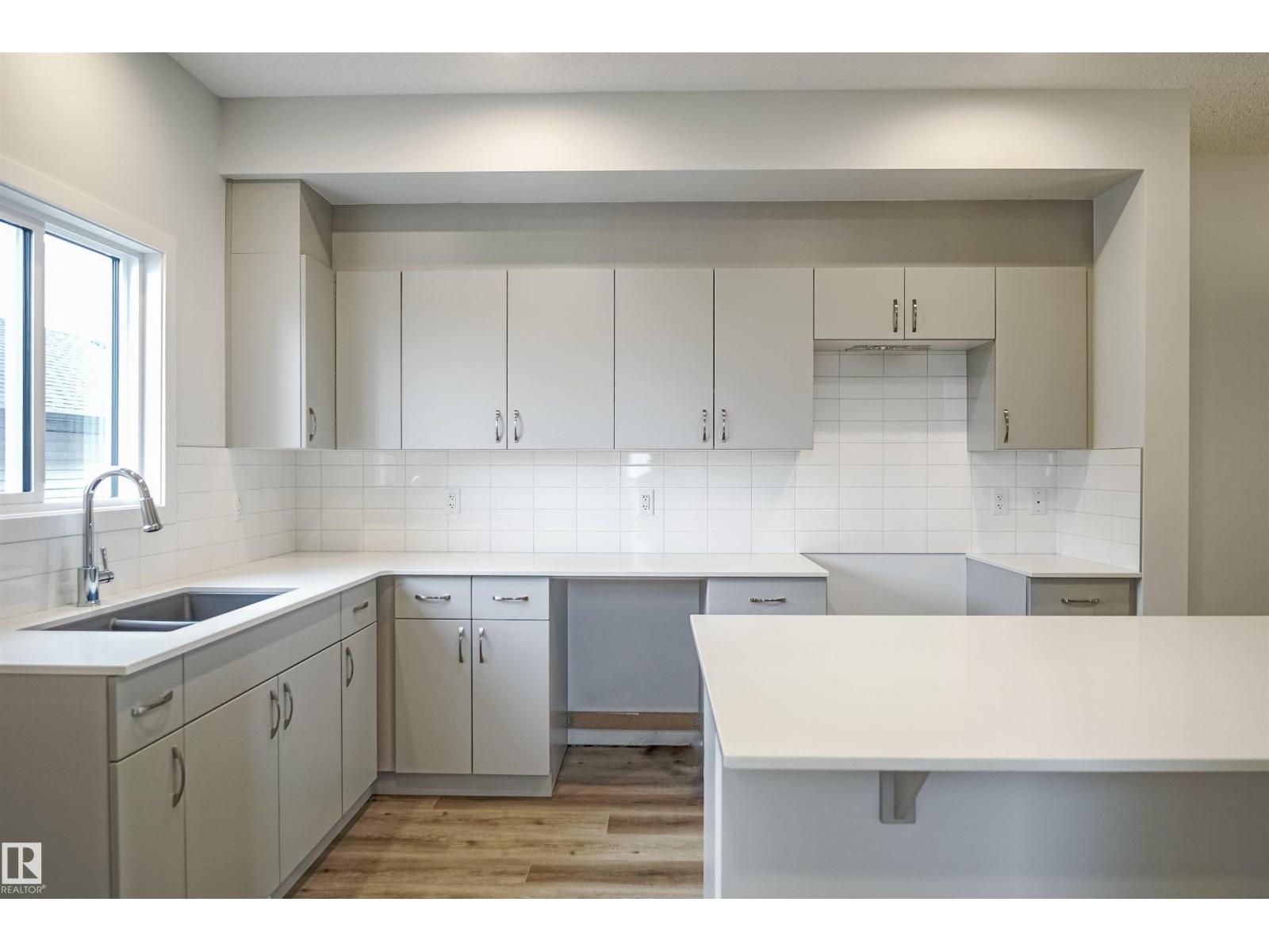 119 Copperhaven Dr, Spruce Grove, AB - Indoor Photo Showing Kitchen With Double Sink