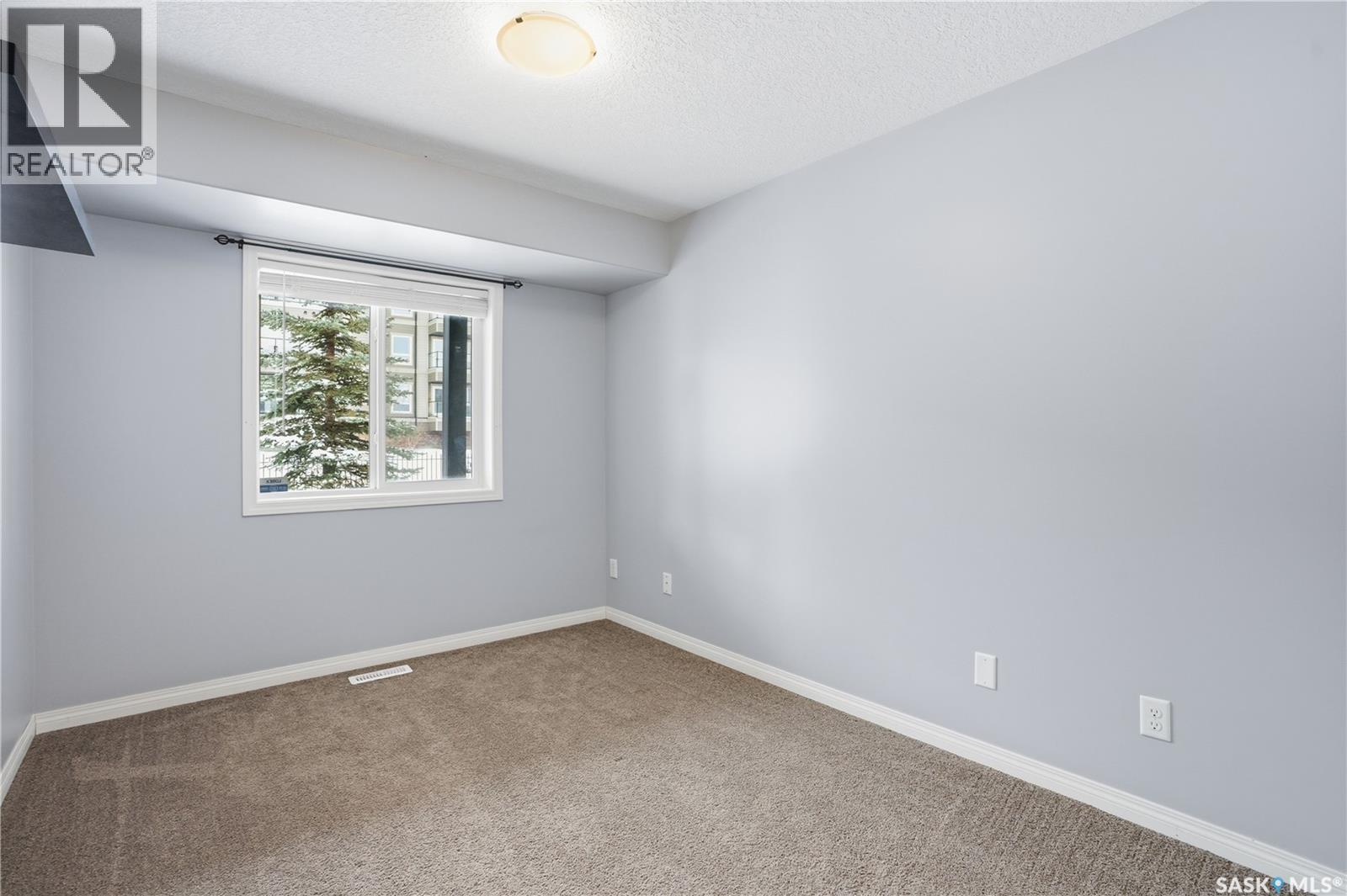 116 125 Willis Crescent, Saskatoon, SK - Indoor Photo Showing Other Room