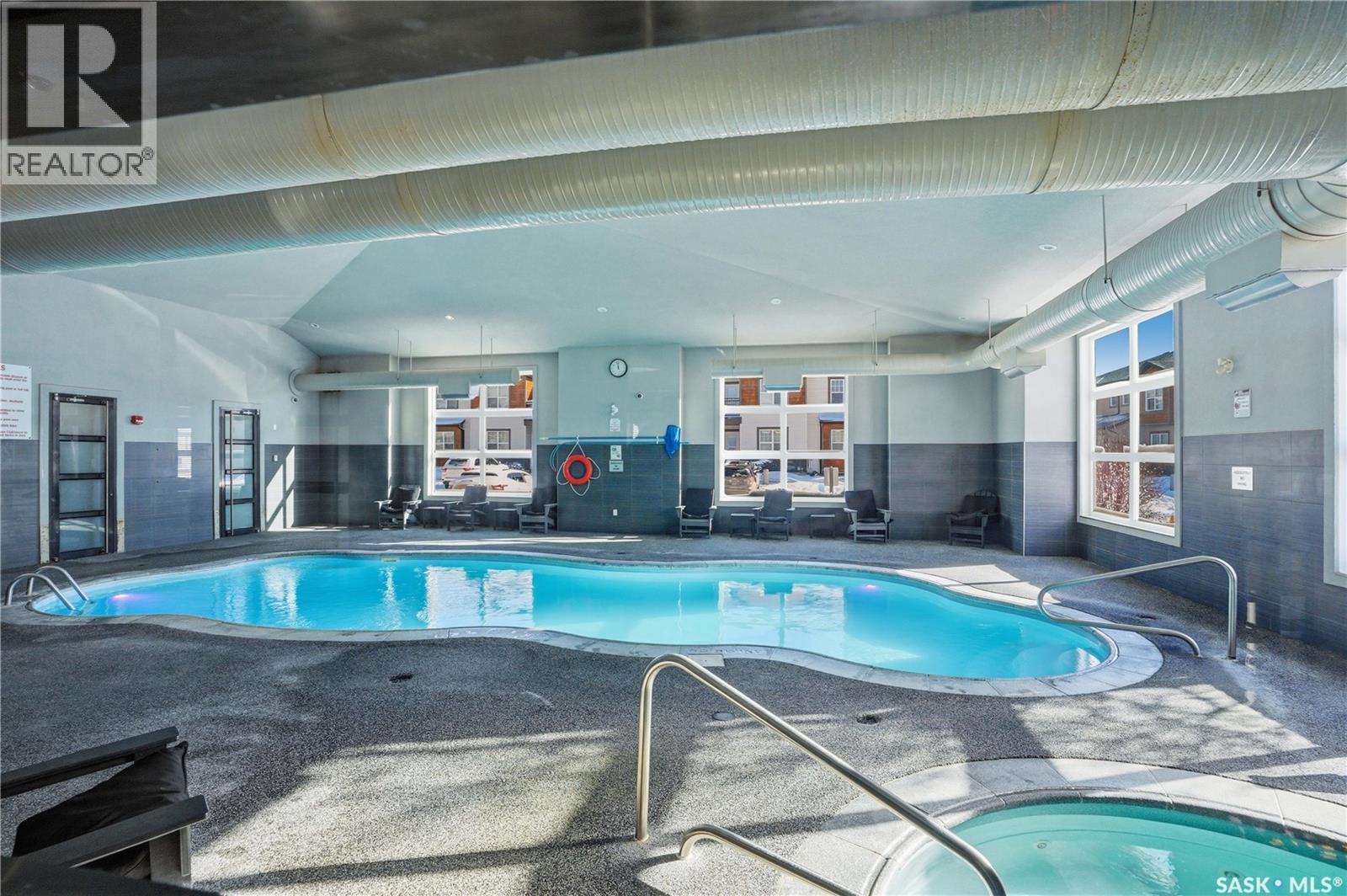 504 1015 Patrick Crescent, Saskatoon, SK - Indoor Photo Showing Other Room With In Ground Pool