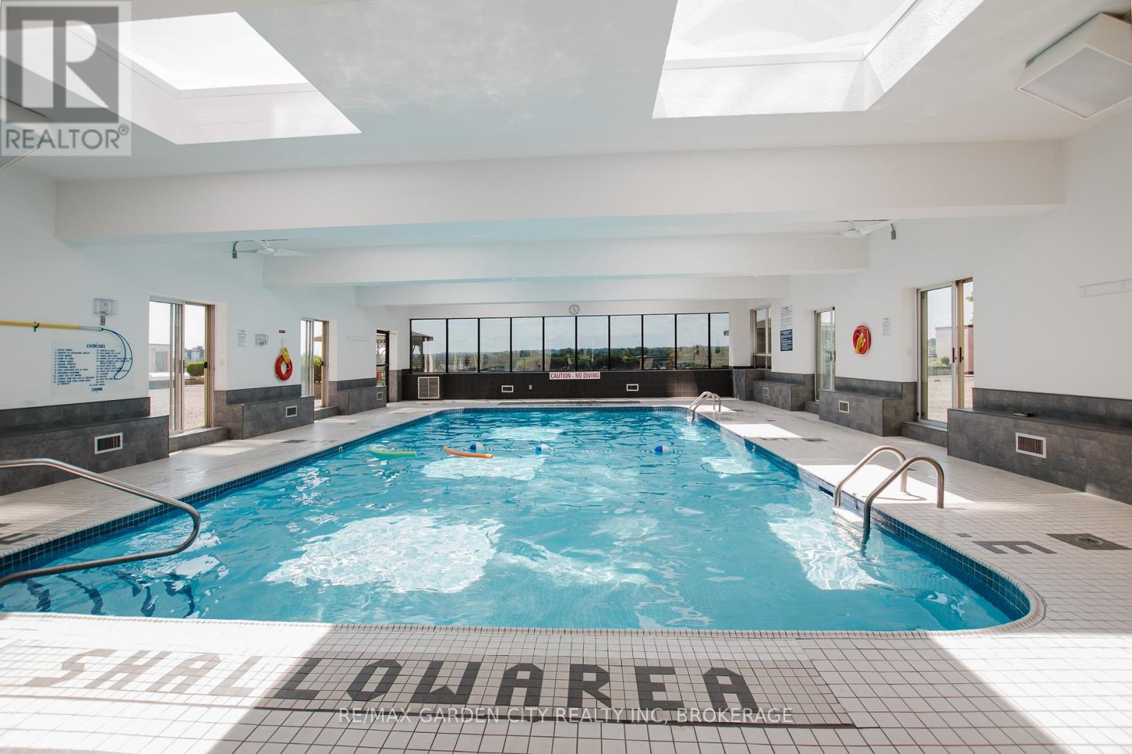 307 - 7 Gale Crescent, St. Catharines (E. Chester), ON - Indoor Photo Showing Other Room With In Ground Pool