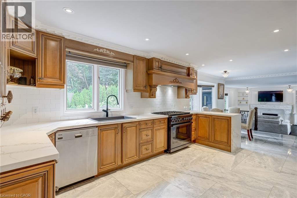 28 Stonegate Drive, Hamilton, ON - Indoor Photo Showing Kitchen With Fireplace