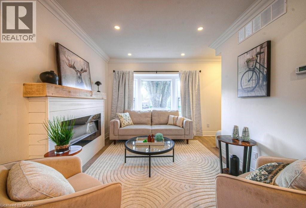30 Dunbar Road S, Waterloo, ON - Indoor Photo Showing Living Room With Fireplace