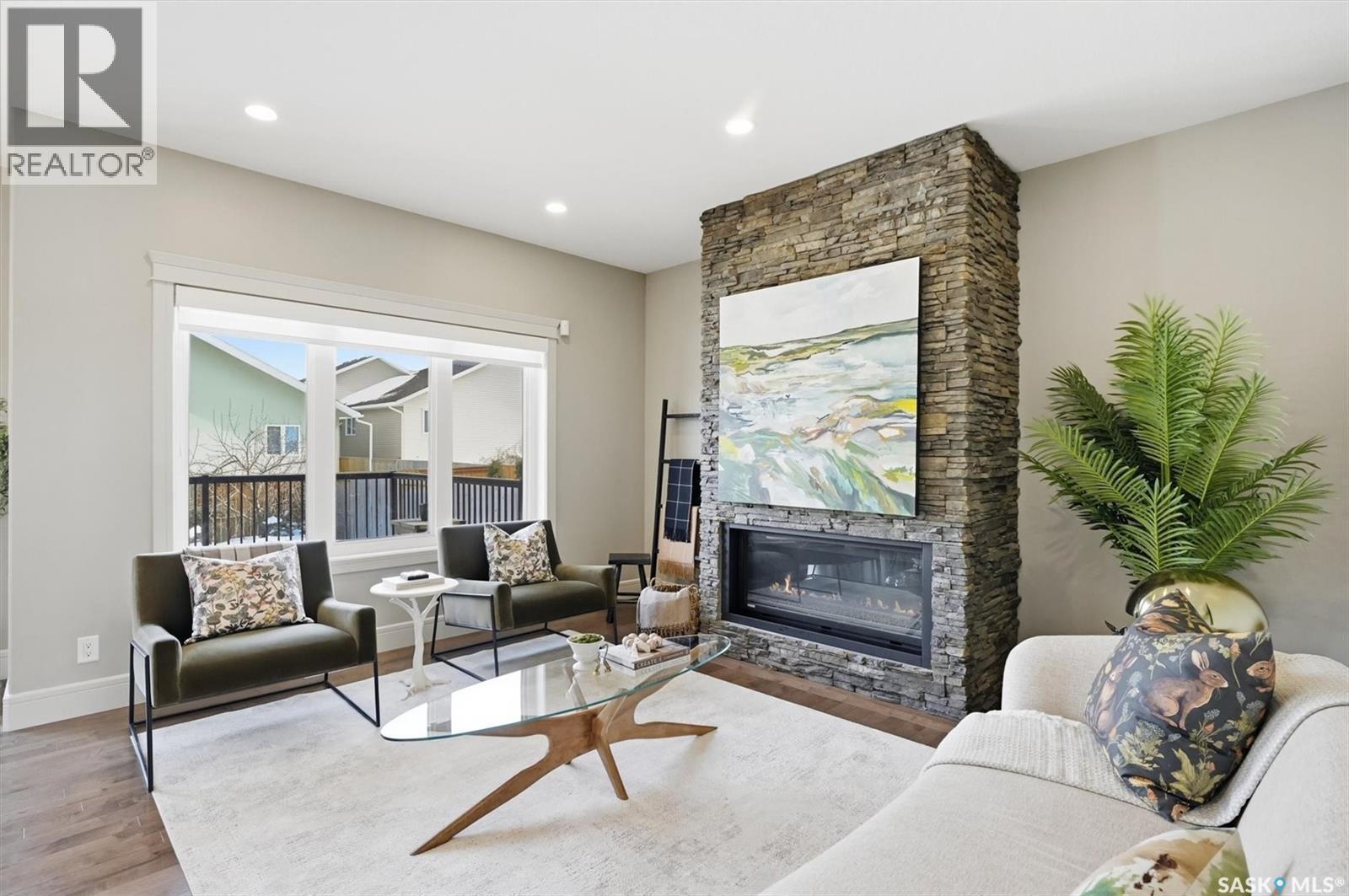 171 Roy Crescent, Saskatoon, SK - Indoor Photo Showing Living Room With Fireplace