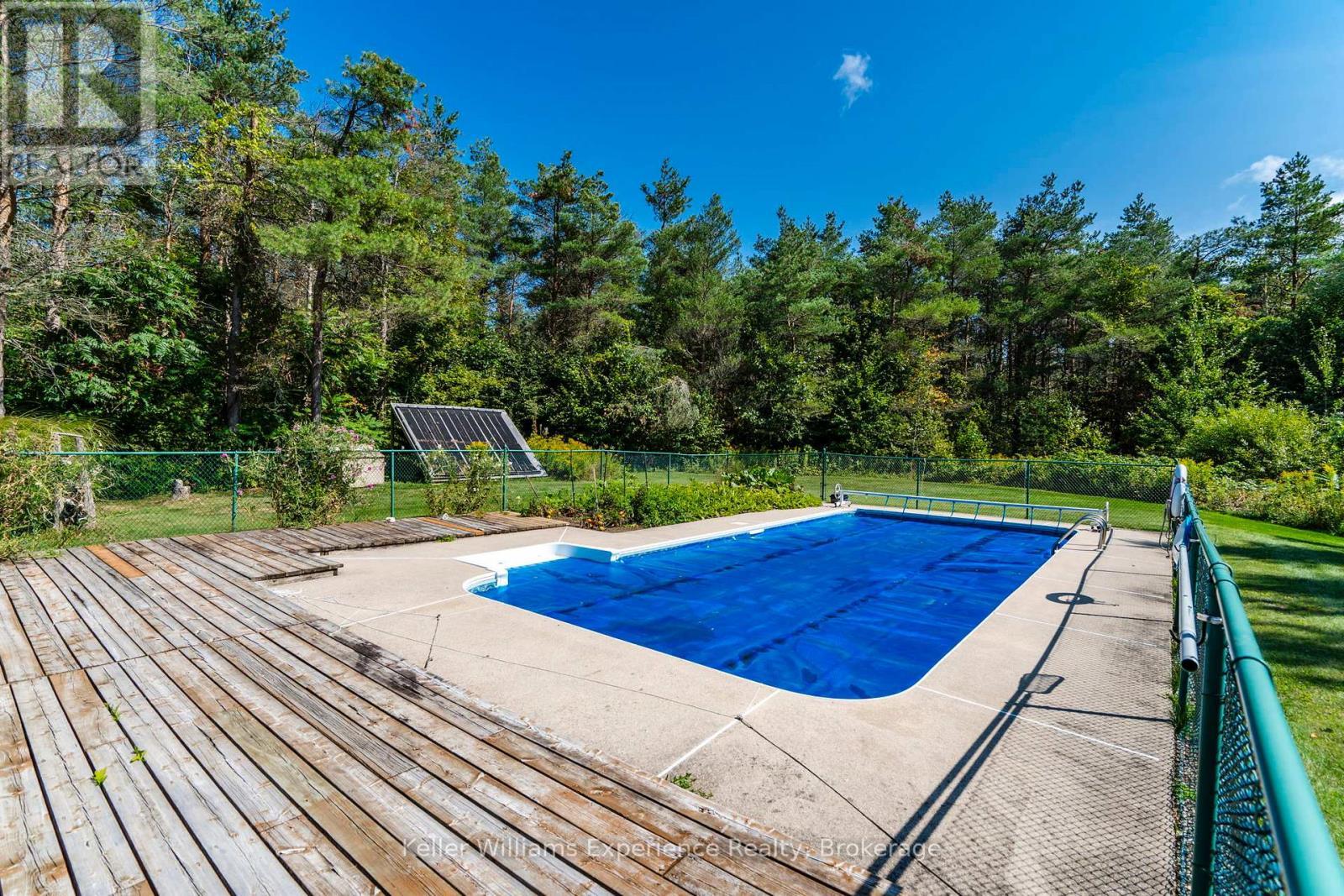 Solar Heated pool - 257 15 Concession E, Tiny, ON - Outdoor With In Ground Pool With Backyard