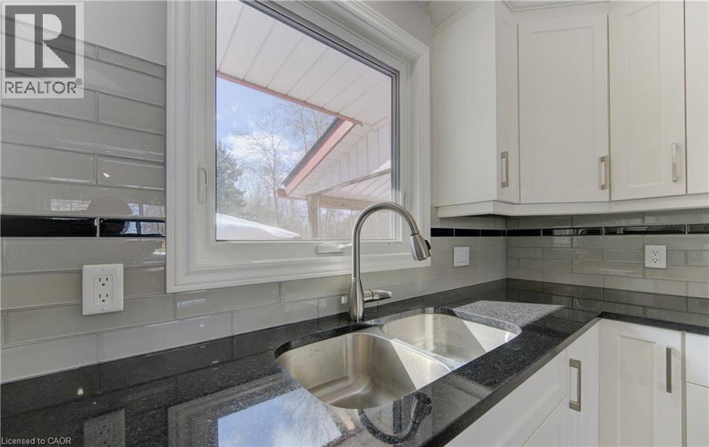 583 Rustic Drive, Waterloo, ON - Indoor Photo Showing Kitchen With Double Sink