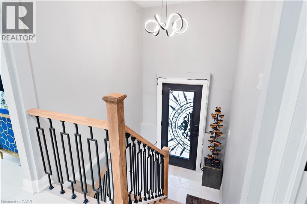 Entryway with a chandelier - 19 Broad Street, Brantford, ON - Indoor Photo Showing Other Room