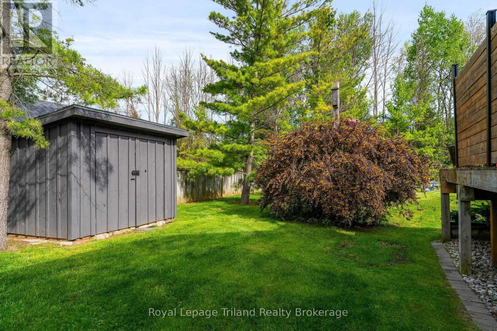 Gated access to the fenced backyard - 19 Trails End, Collingwood, ON