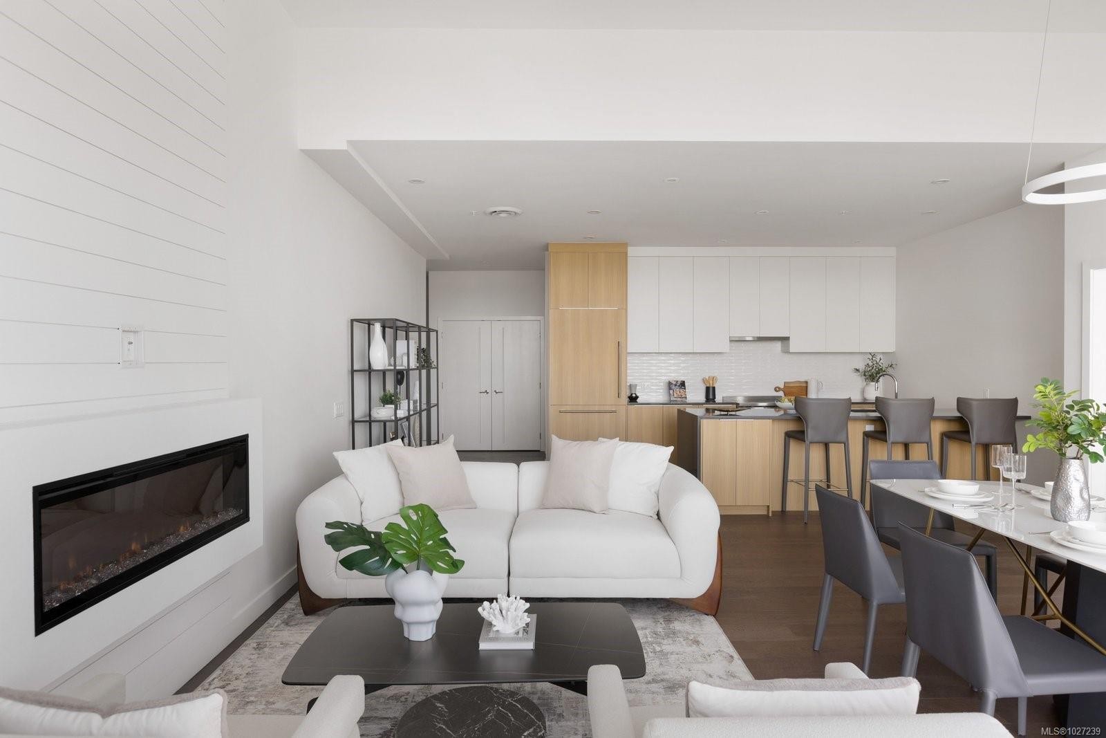 #401-9570 Fifth St, Sidney, BC - Indoor Photo Showing Living Room With Fireplace